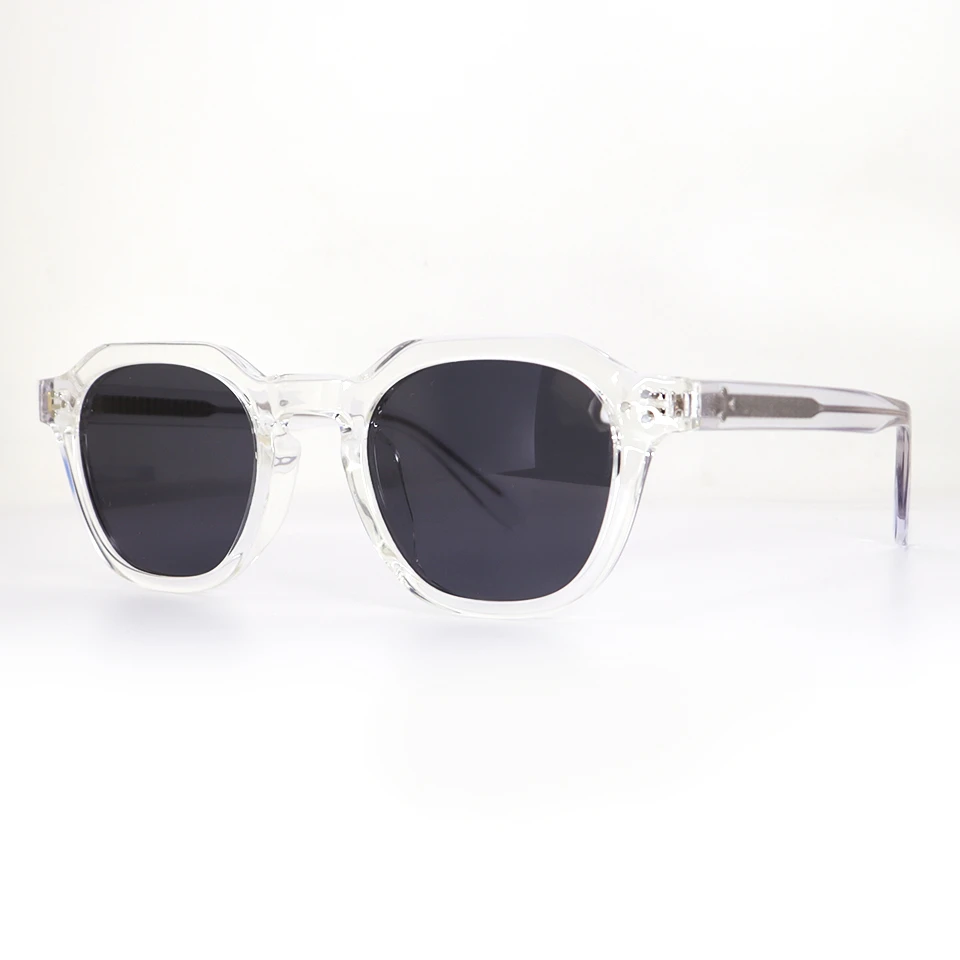 Custom clear acetate sunglasses head-on view with clean frame lines and UV400 lenses Custom clear acetate sunglasses head-on view with clean frame lines and UV400 lenses