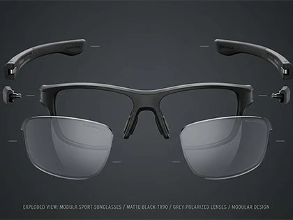 exploded-view-of-modular-sport-sunglasses-showing-front-frame-two-detachable-temples-and-two-interchangeable-lenses-floating-in-alignment-matte-black-TR90-and-grey-polarized-lenses-dark-grey-seamless-background-sof exploded-view-of-modular-sport-sunglasses-showing-front-frame-two-detachable-temples-and-two-interchangeable-lenses-floating-in-alignment-matte-black-TR90-and-grey-polarized-lenses-dark-grey-seamless-background-sof